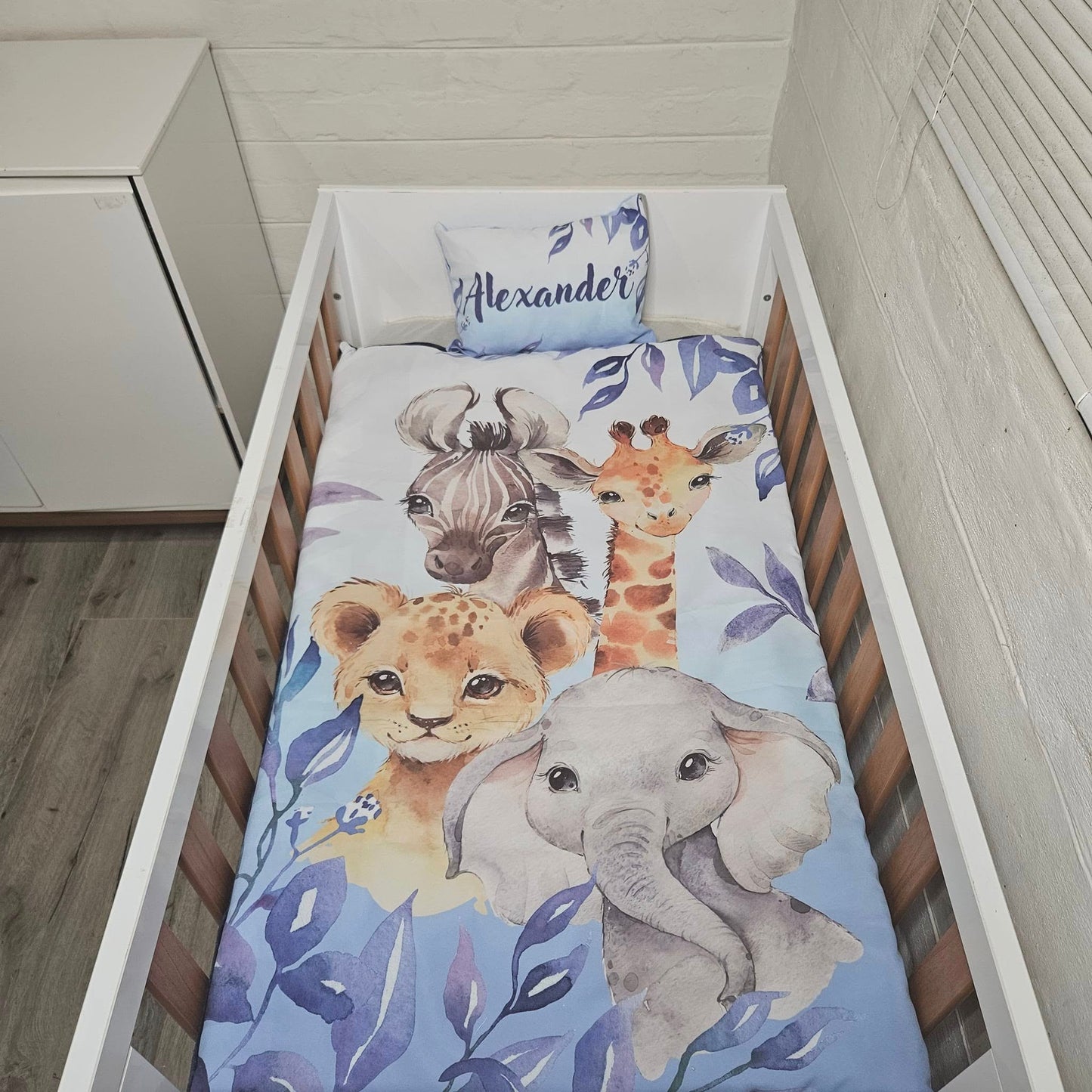 Blue Leafy Safari cot linen