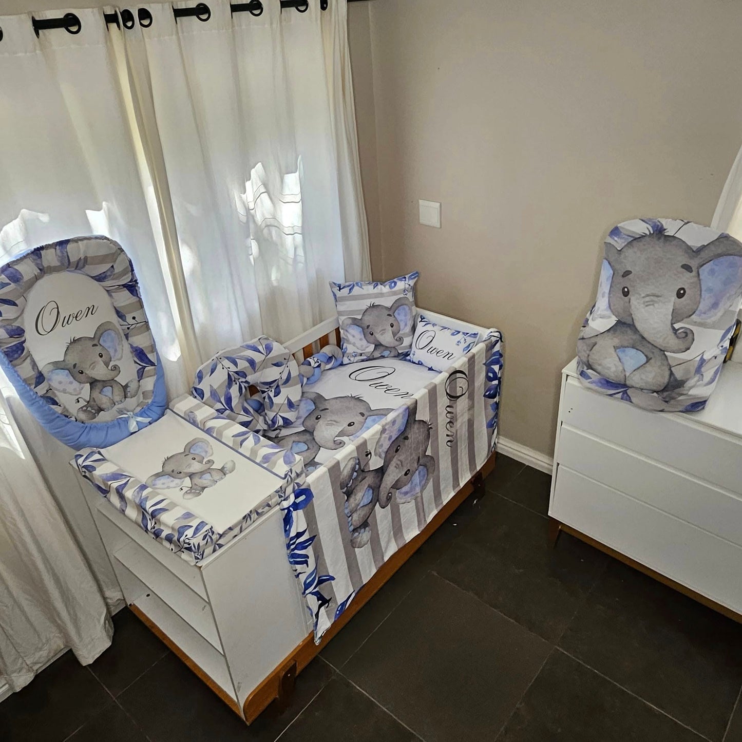 Owen the cute Baby Blue Ellie cot linen +