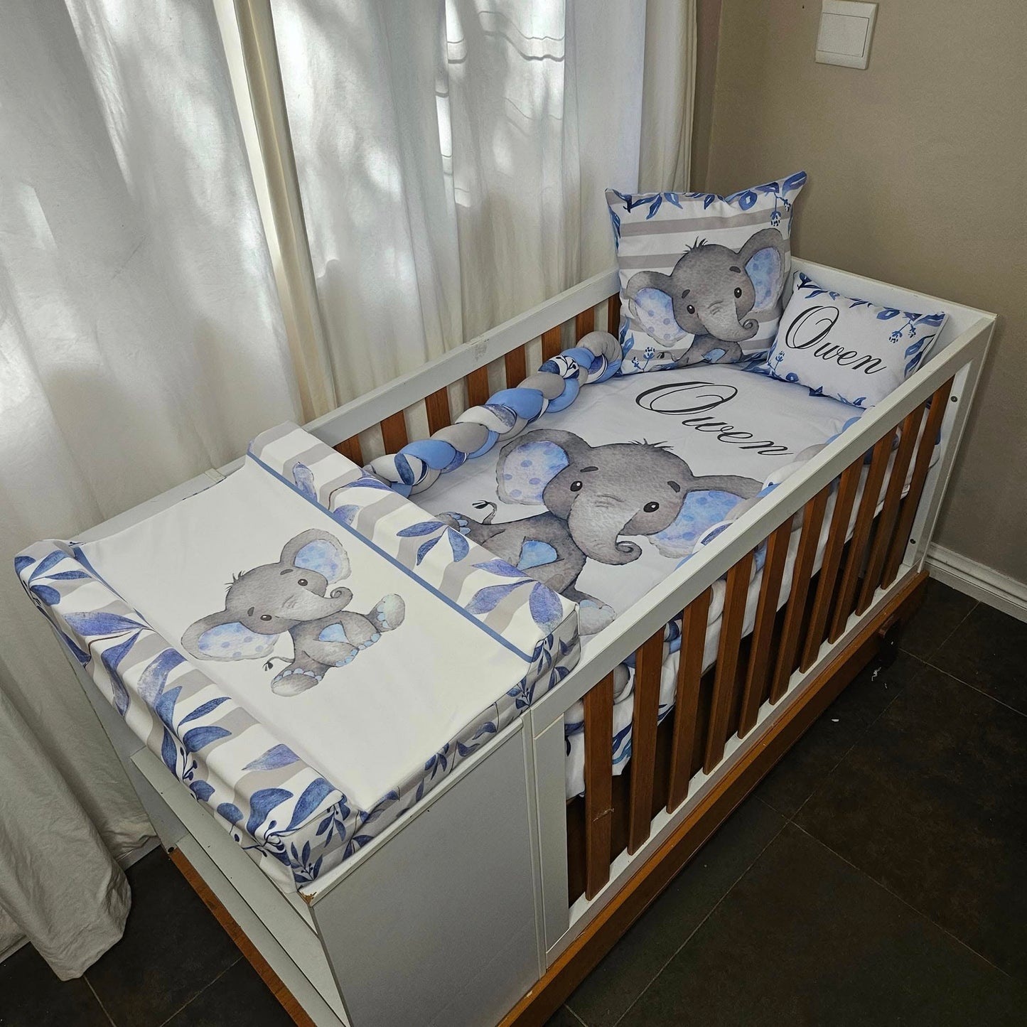 Owen the cute Baby Blue Ellie cot linen +