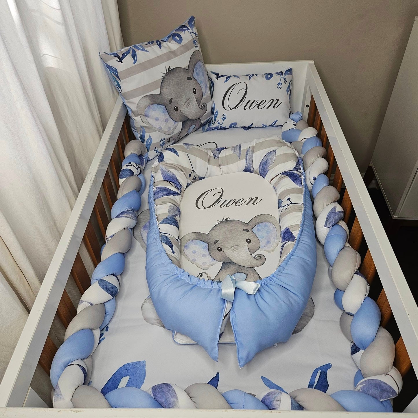 Owen the cute Baby Blue Ellie cot linen +