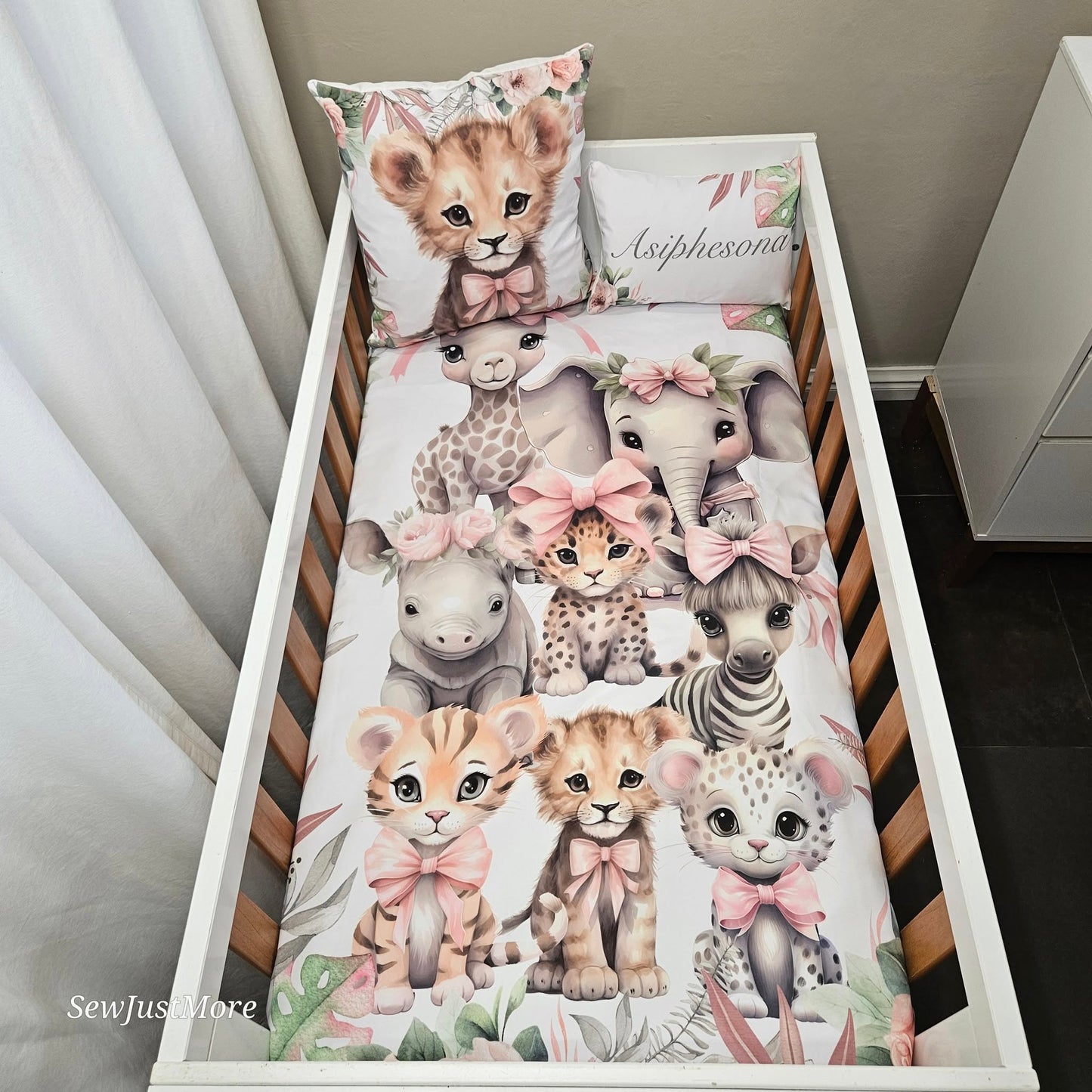 Pink Tropical Safari cot linen