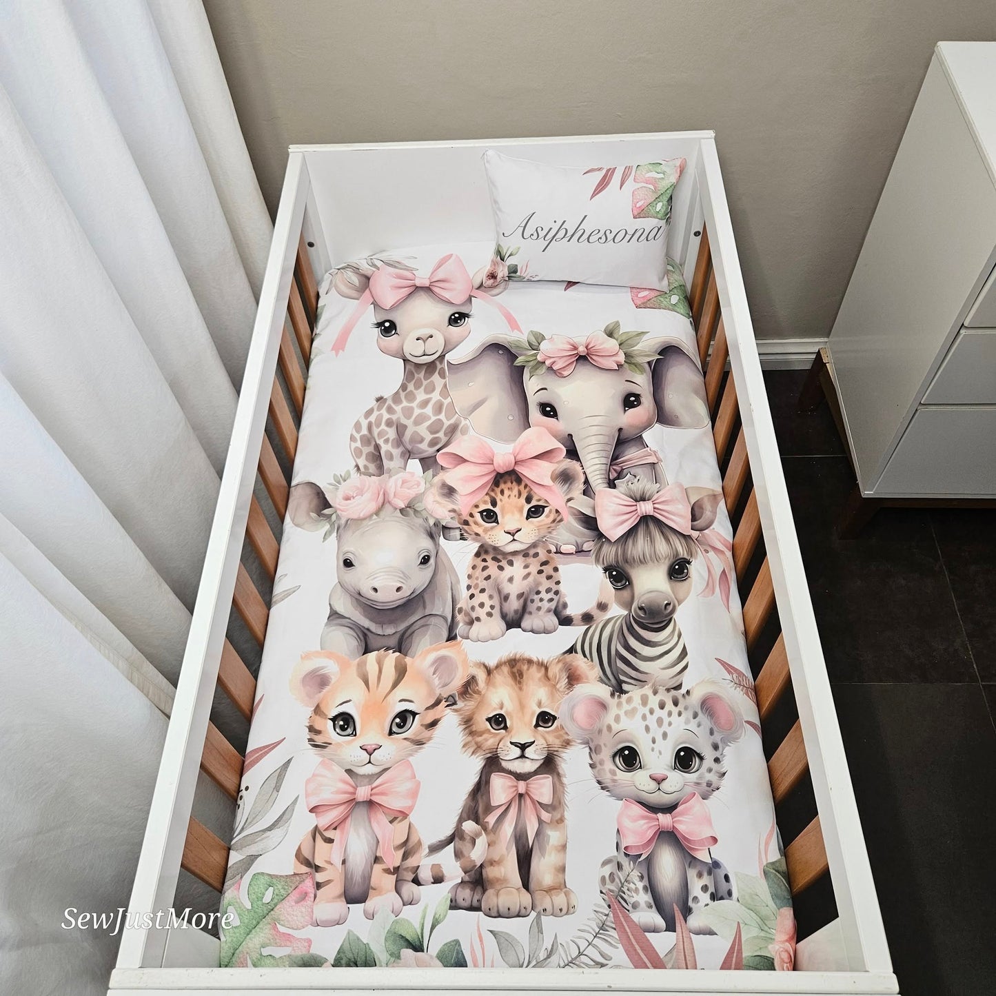 Pink Tropical Safari cot linen
