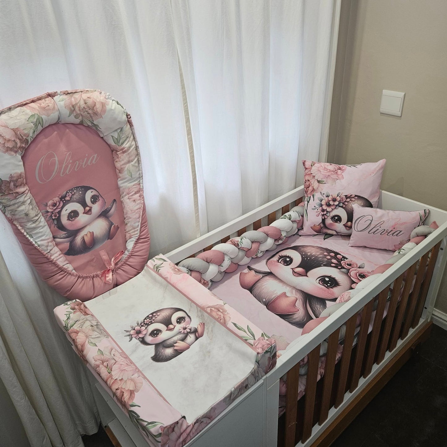 Peony Penguin cot linen