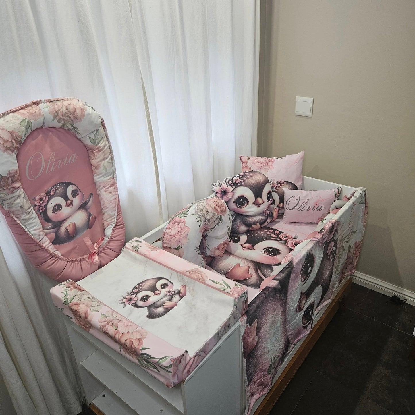 Peony Penguin cot linen