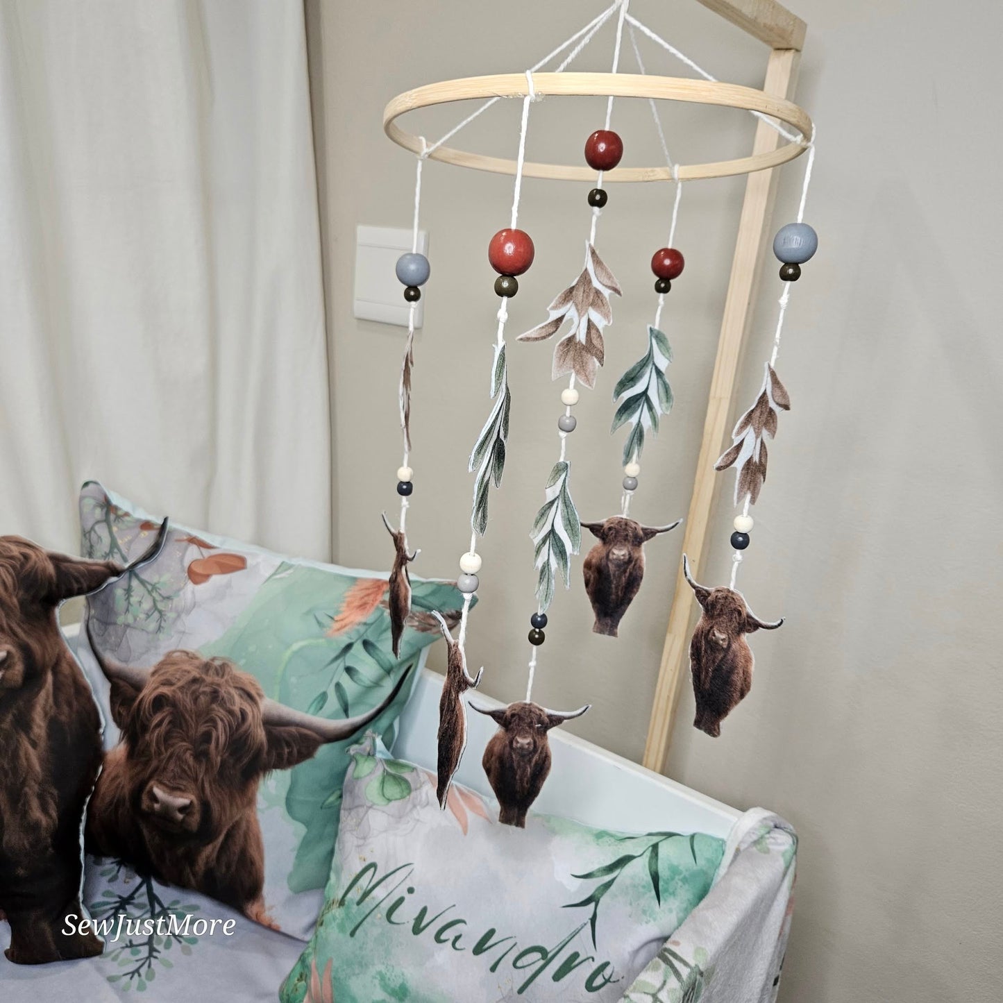 The Highland cow Cot Mobile