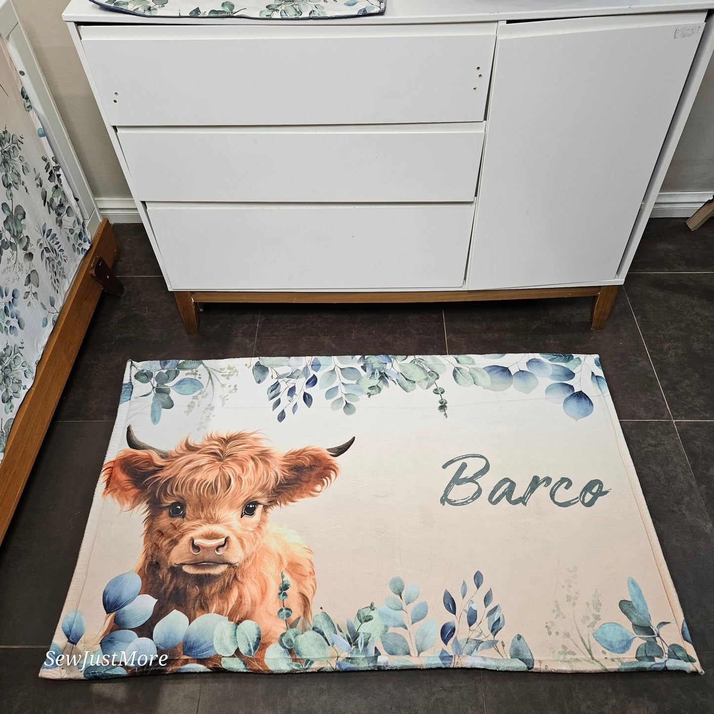 The Baby Highland cow Carpet