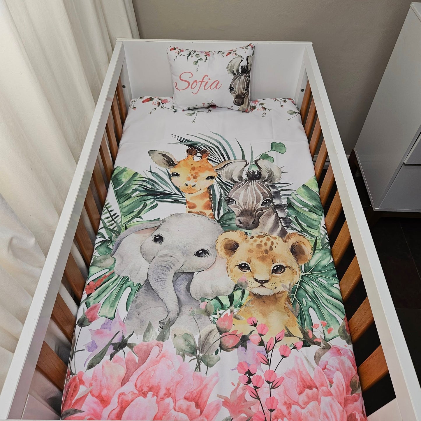 Soft Floral Safari cot linen
