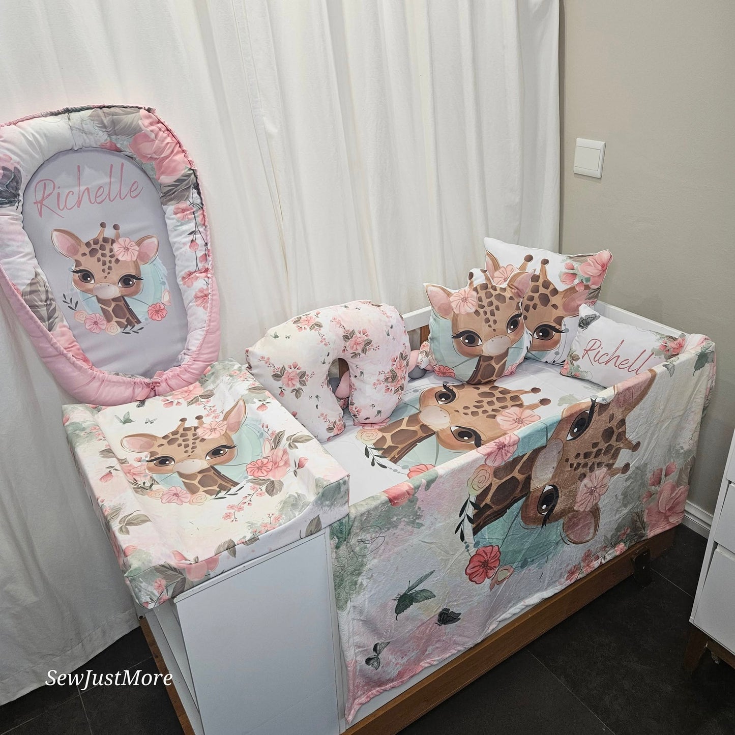 Rosy The Giraffe sage cot linen