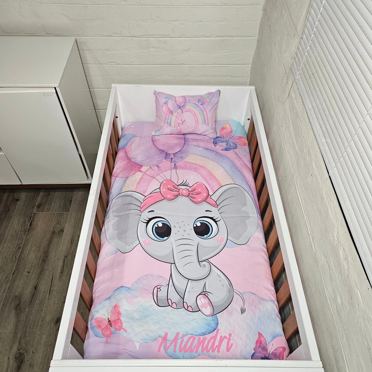 Magical Rainbow Cartoon Ellie cot linen