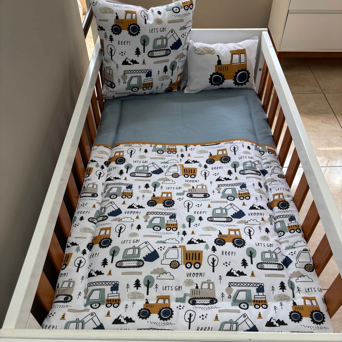 Baby Blue and Mustard Construction  cot linen